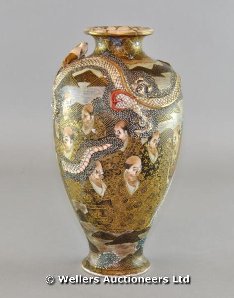 "A 19thC Japanese Satsuma vase decorated with scholars and dragons, gilt Mon mark to side and