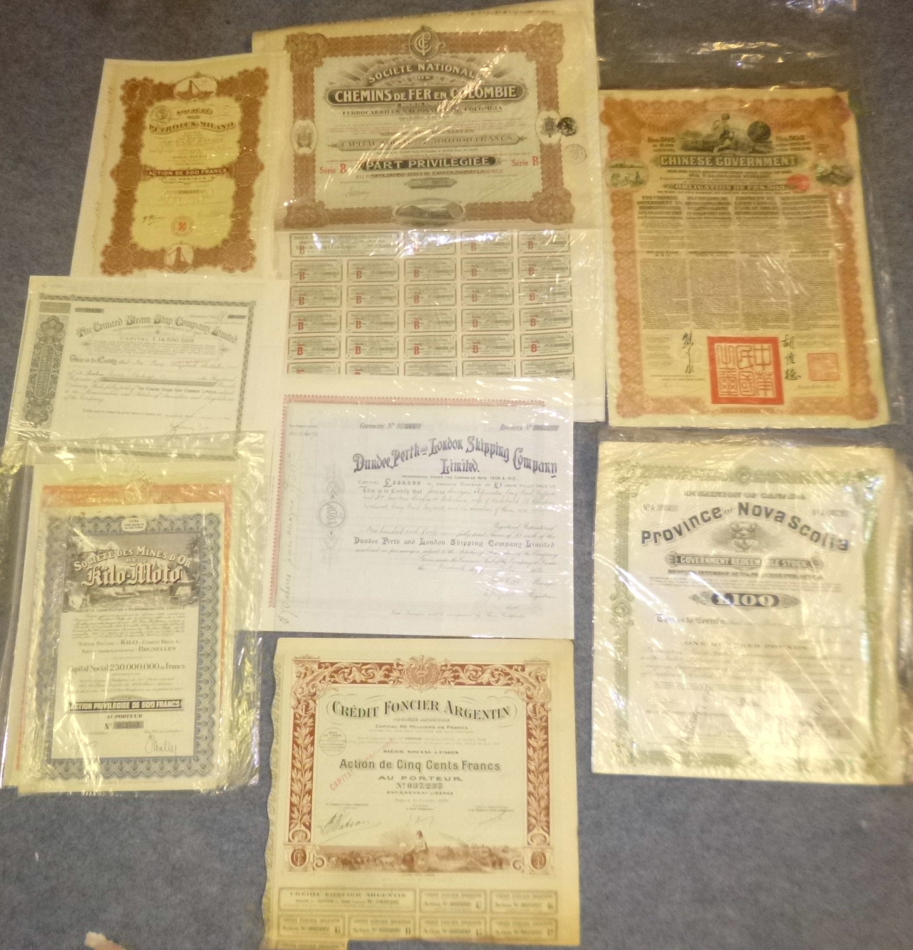Folder of old Share Certificates & other paperwork