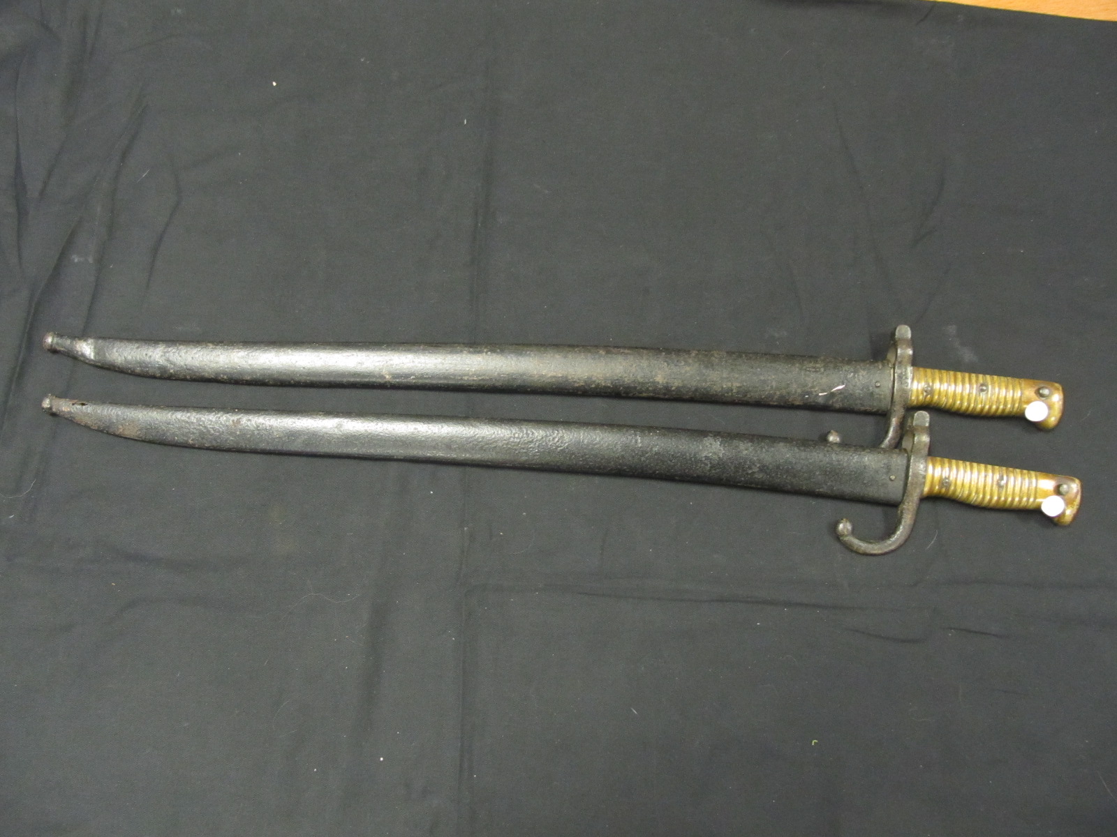 French chasapo bayonets two of with scabbards.