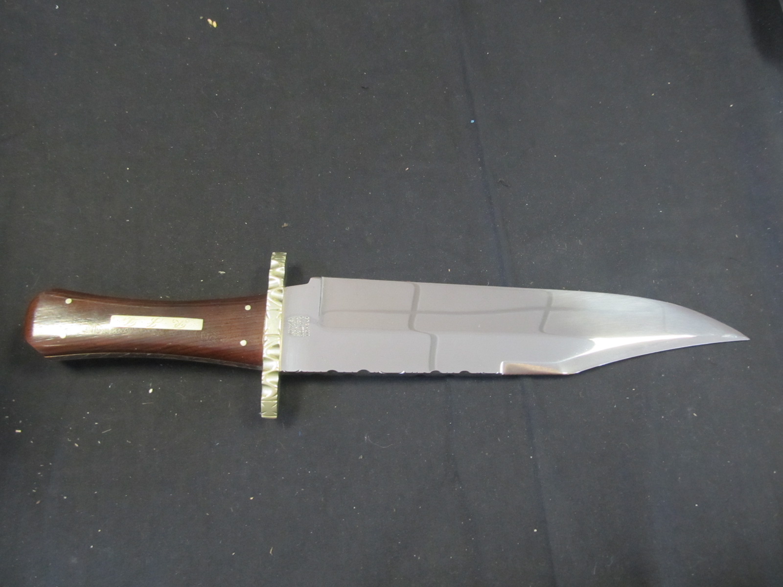 Bowie knife-a large and impressive handmade piece, heavy blade approx 10" long, and 2" wide at