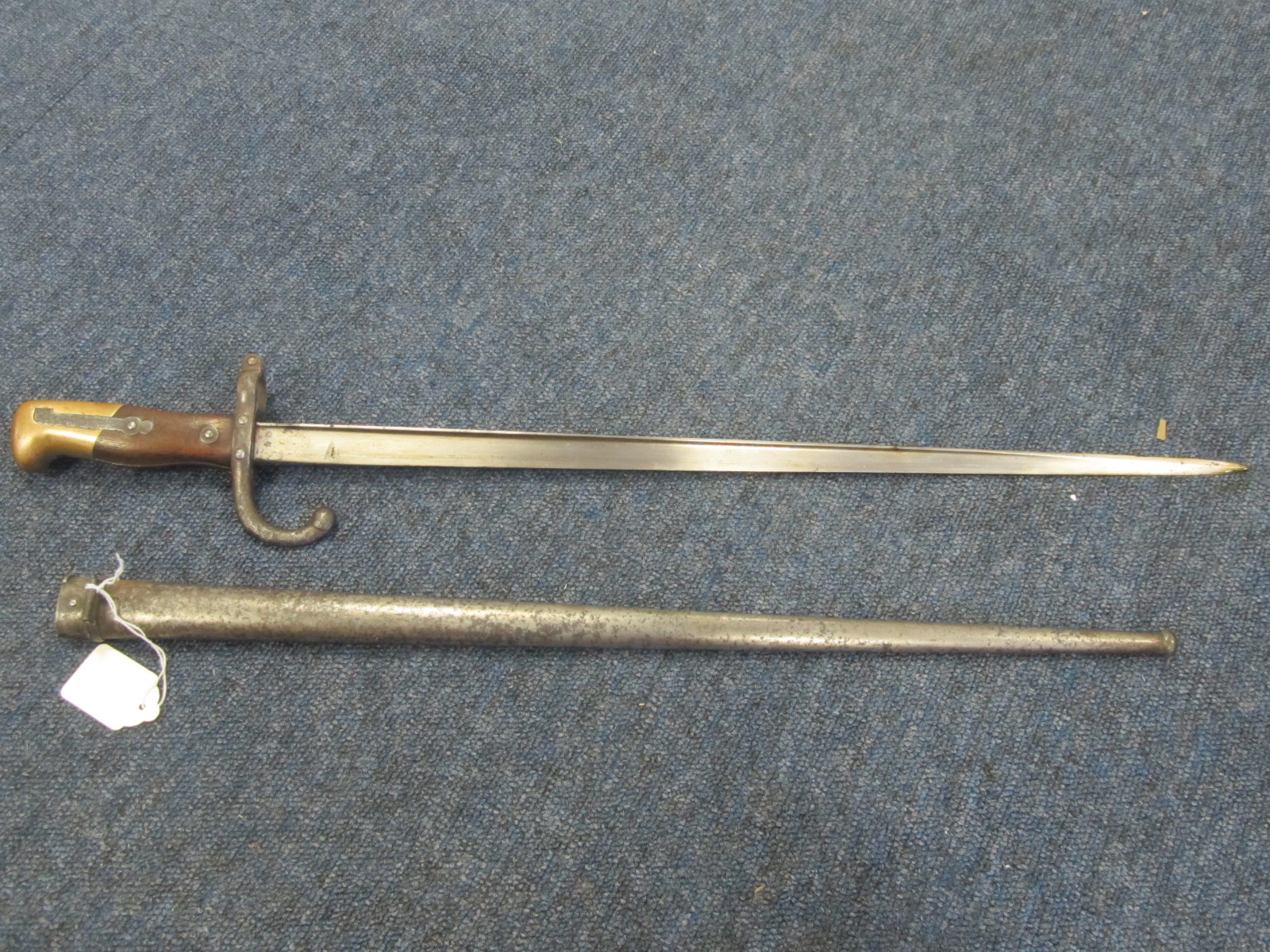 French model 1874 Gras Epee bayonet in its steel scabbard. Made at St Etienne, January 1880. Some