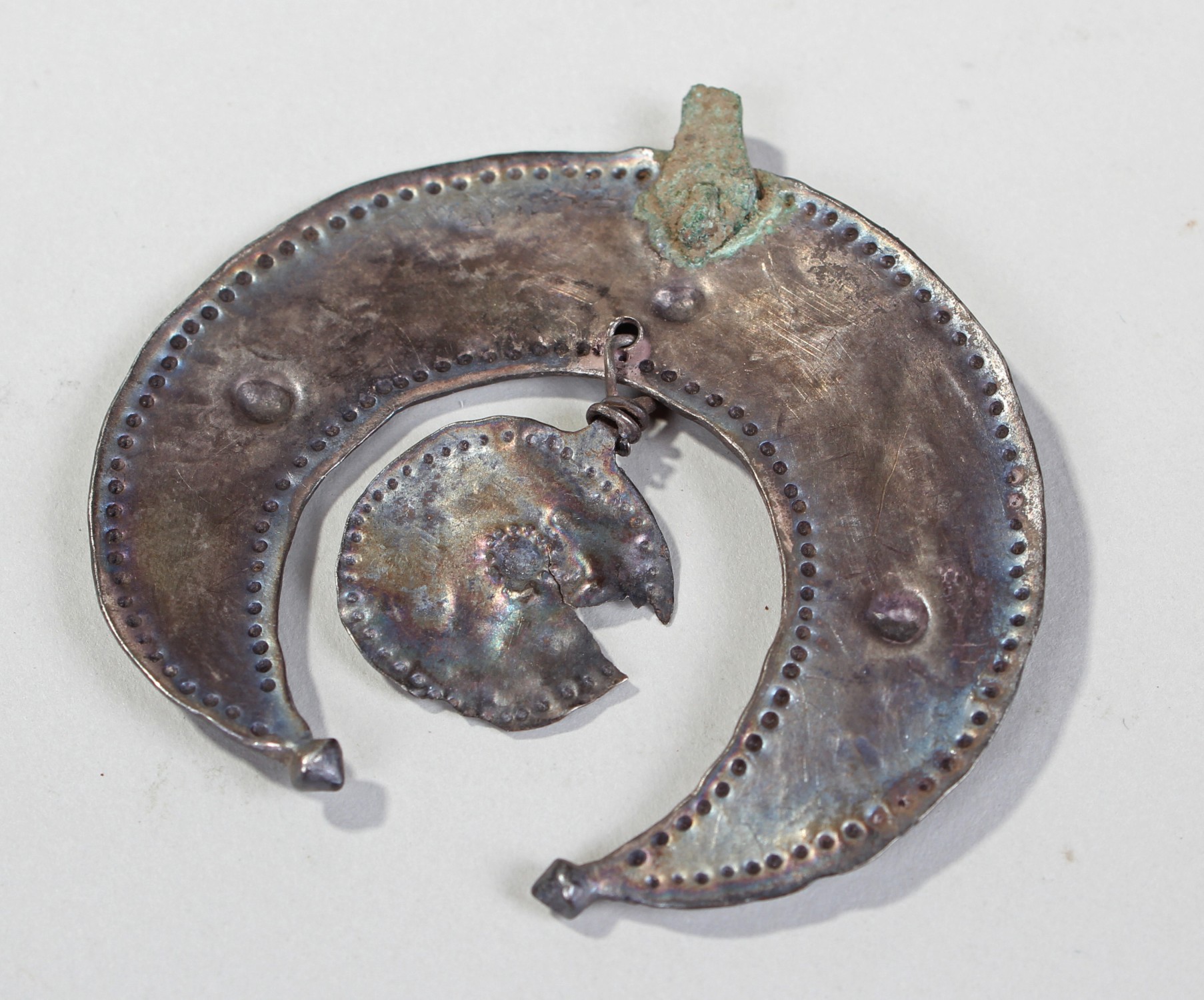 Viking silver lunate and disc pendant, crescent silver sheet with soldered on stud terminals,