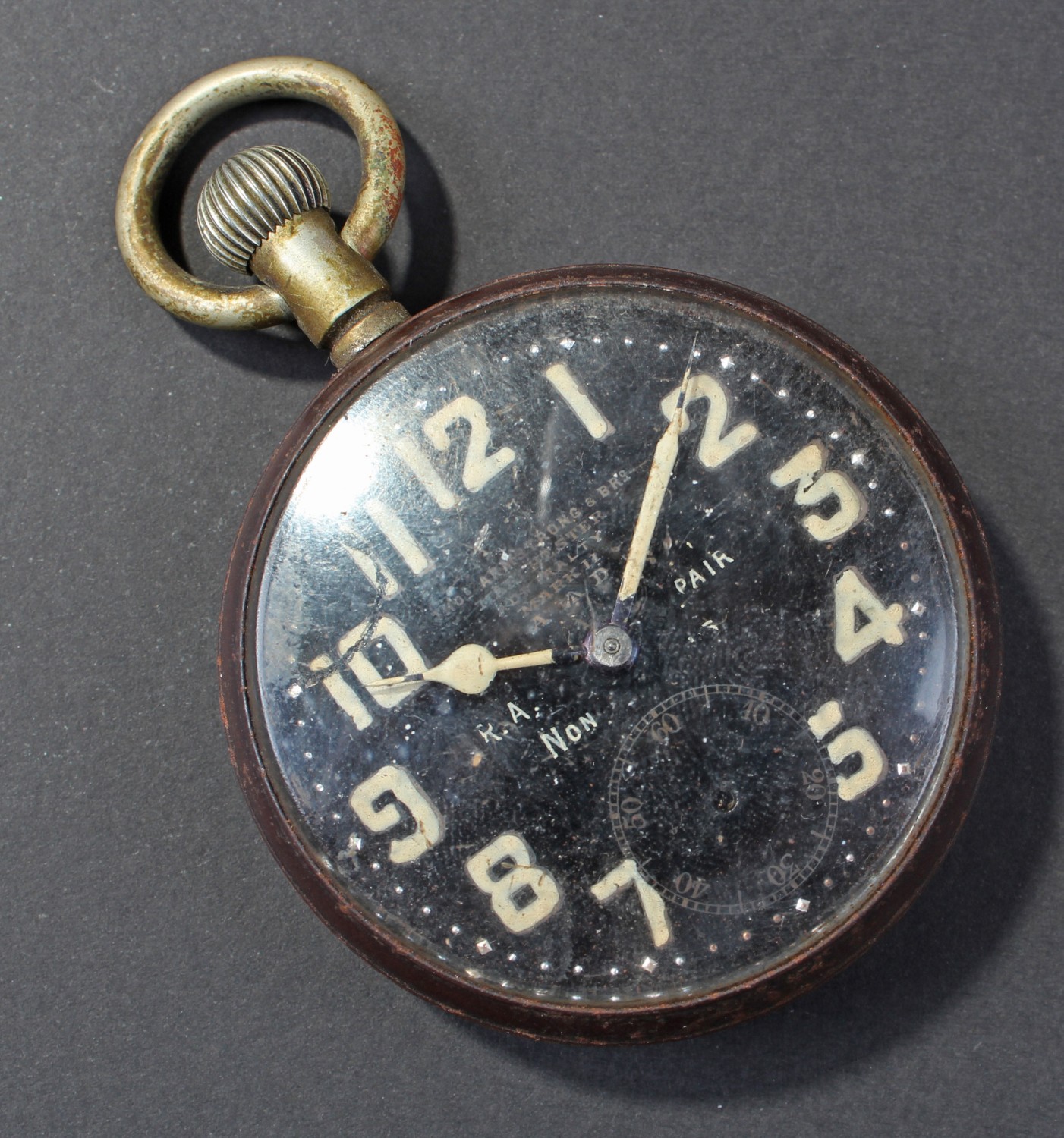Military pocket watch, the black enamel dial having white arabic numerals, subsidiary dial set at