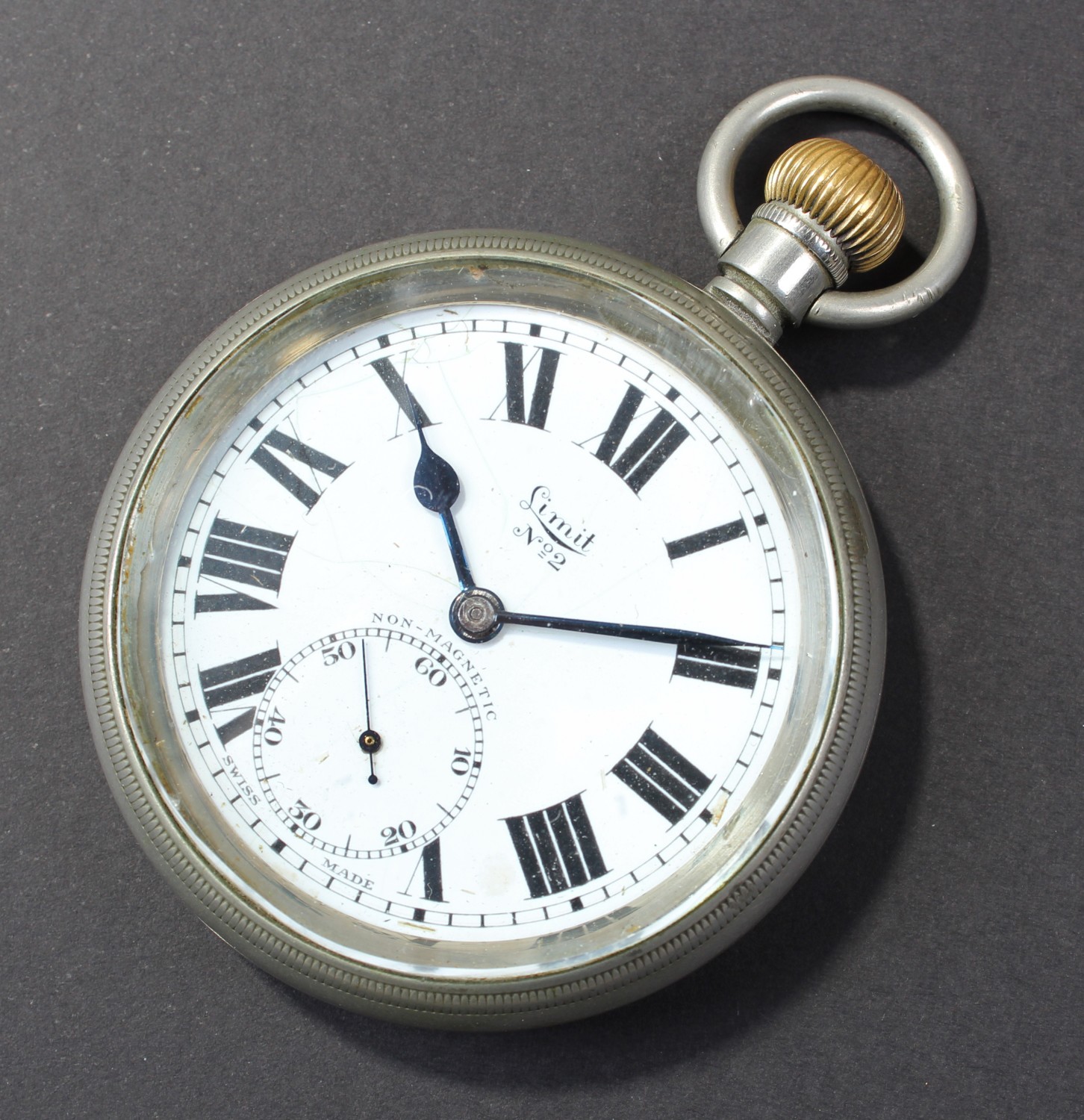 L.M.S. railway open face pocket watch, the white enamel dial having black roman numerals, surrounded