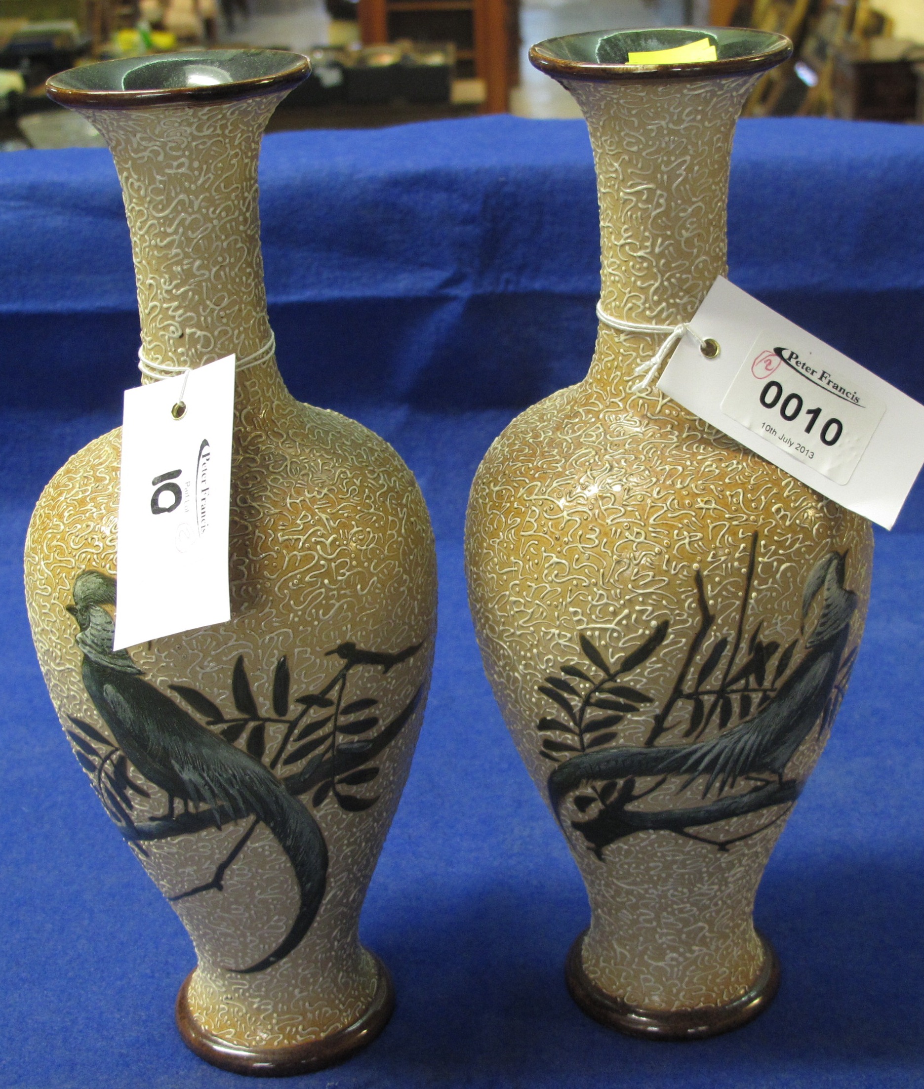 Pair of Doulton Lamberth stoneware baluster vases with extended necks, overall decorated with