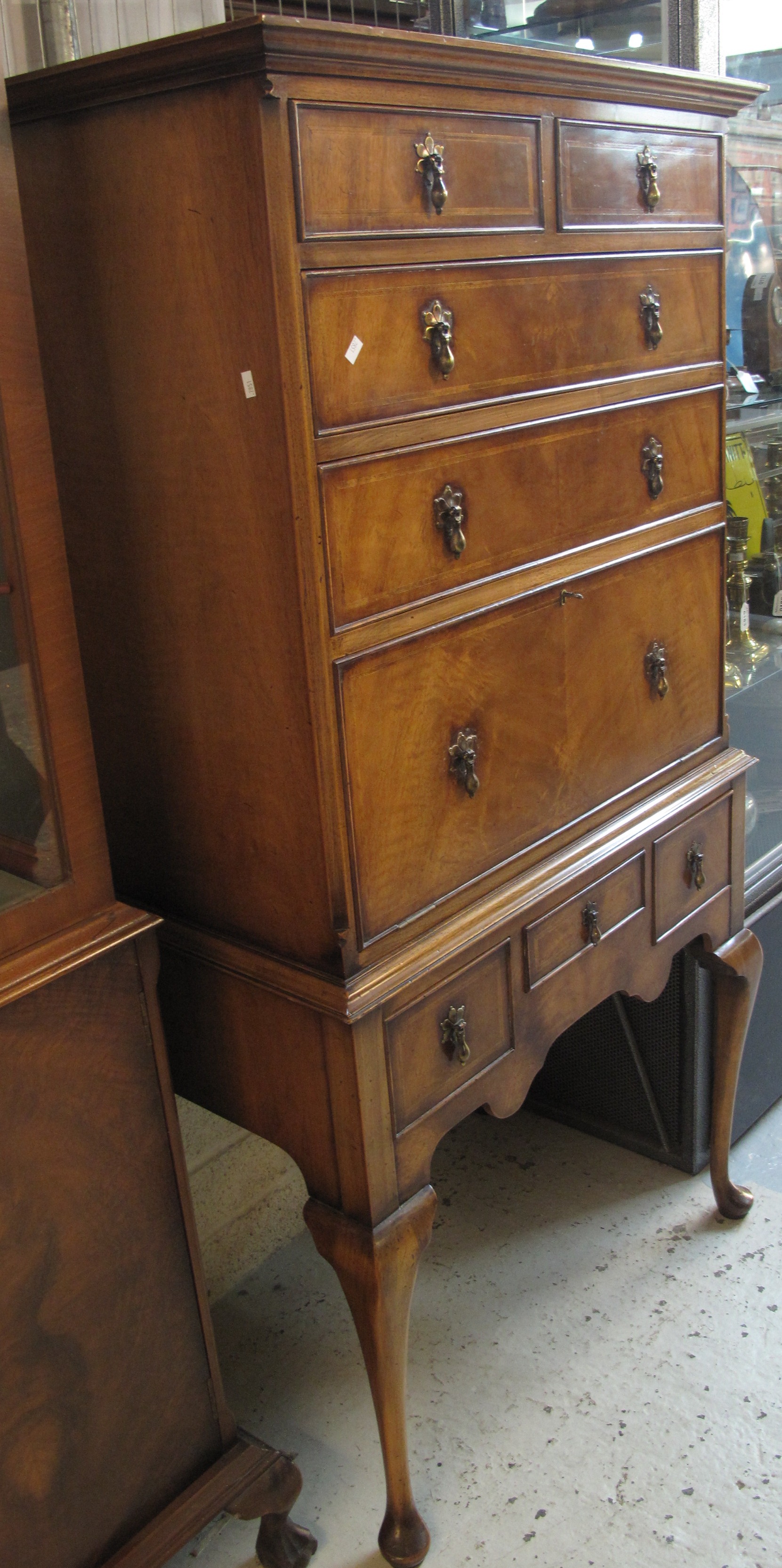 Reproduction Queen Ann style herringbone strung secretaire chest on stand