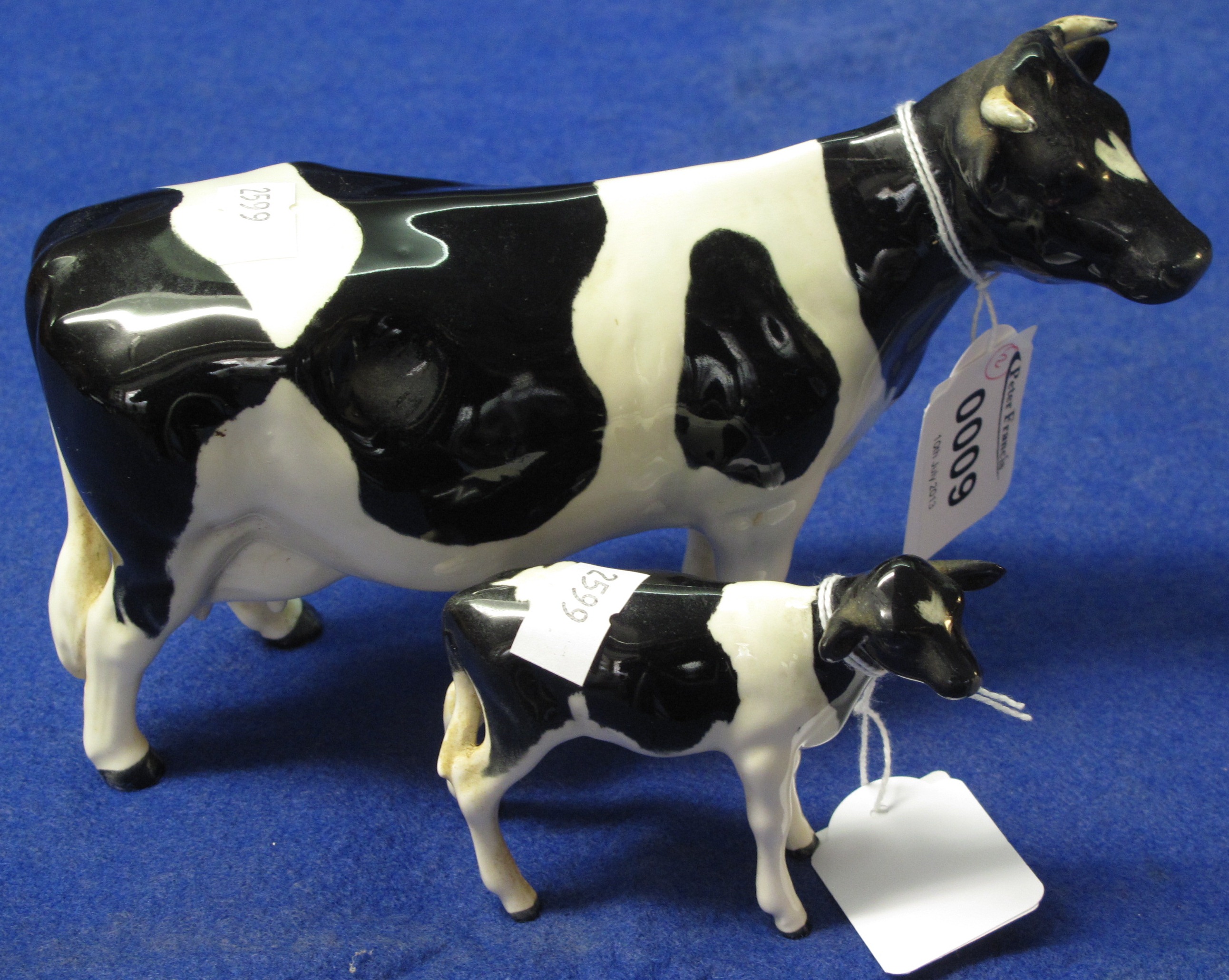 Beswick China Holstein Black & White Cow "Champion Claybury Leadwater" together with similar Beswick