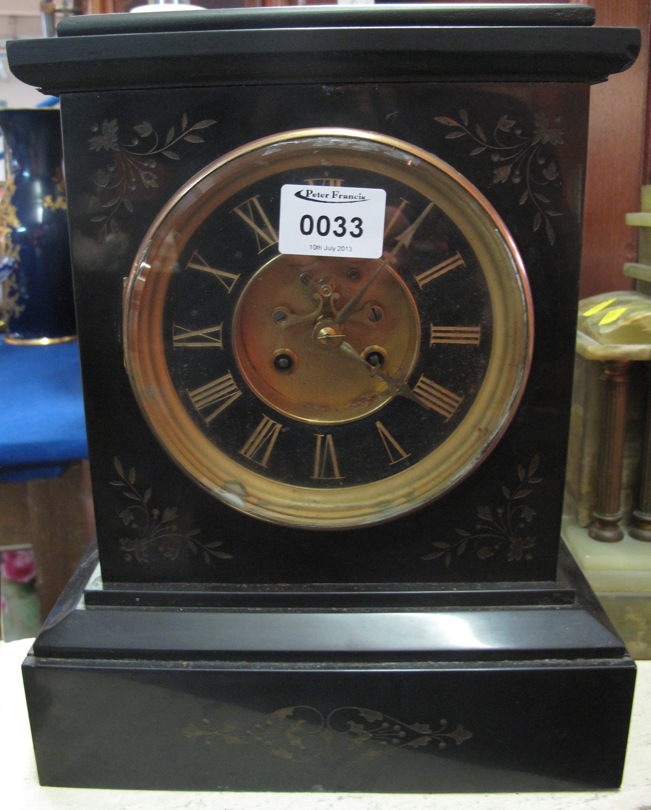 19c black slate two train mantle clock with exposed escapement