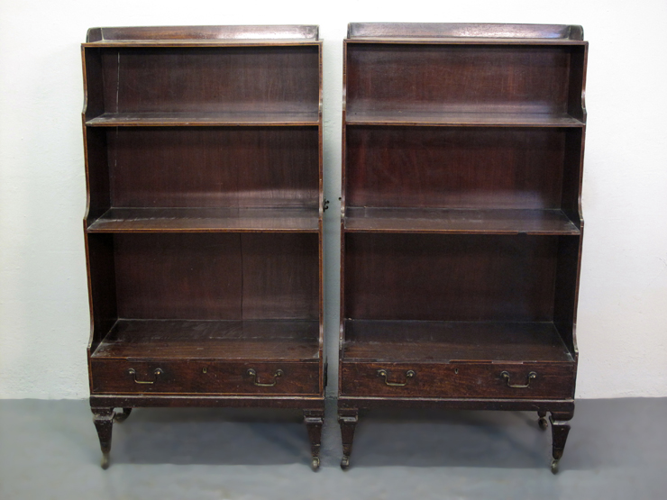 PAIR OF GEORGIAN MAHOGANY WATERFALL BOOKCASES, each with galleried top above two fitted shelves,