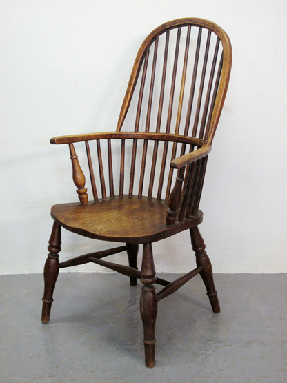19TH CENTURY ASH AND ELM WINDSOR HOOP BACKED FIRESIDE ELBOW CHAIR, with baluster turned supports