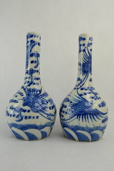 A pair of Chinese Porcelain Bottle Vases, bears Qianlong reign mark (1736-1795),, of ovoid form