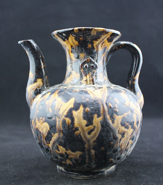 A Chinese Black Glazed Stoneware Teapot. This teapot was made in the style of examples from the