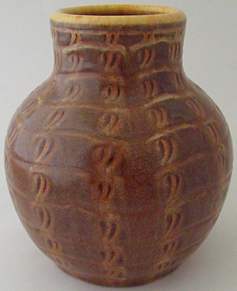 A Pilkingtons Royal Lancastrian vase by William S Mycock, dated 1932, shouldered form cast in low