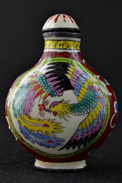 A Chinese Cloisonné Snuff Bottle, bears Qianlong reign mark (1736-1795), ovoid form hand painted