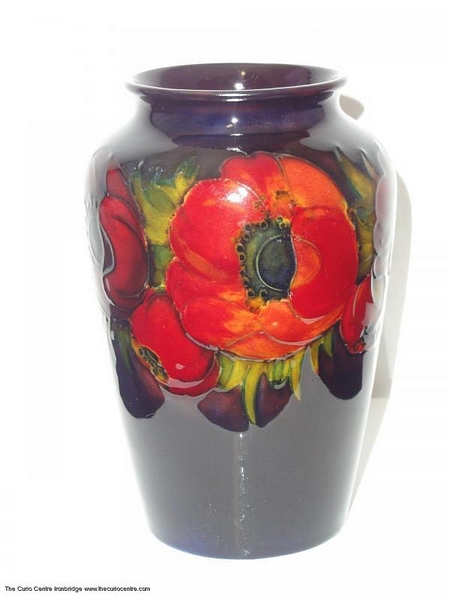 An impressive Moorcroft Flambé Poppy vase, truly great piece of flame, deep red glaze with a mild