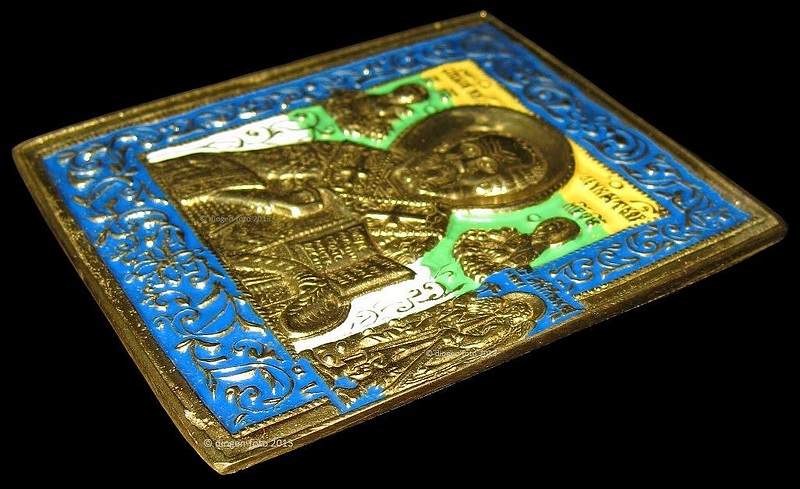 Russian, a 19th.Century brass Icon of St.Nicholas, decorated with four colours of enamel, 10cm x