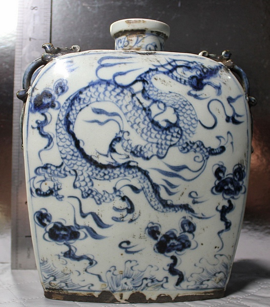 A Chinese Porcelain Bottle Vase. This bottle vase was made in the style of pieces made during the