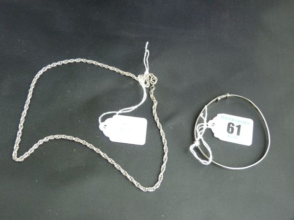 Jewellery.  A bright cut, narrow silver bangle; 7.2 grms. and a sliver double-link neck chain; 10