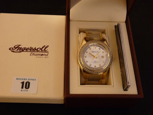 Watch.  A gent`s watch.  A boxed Ingersol diamond gold-plate and stainless steel wristwatch with