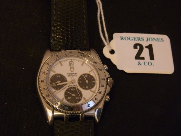 Timepiece.  A wrist chronograph. A gent`s Rolex Tudor Geneve Monarch wrist chronograph with black