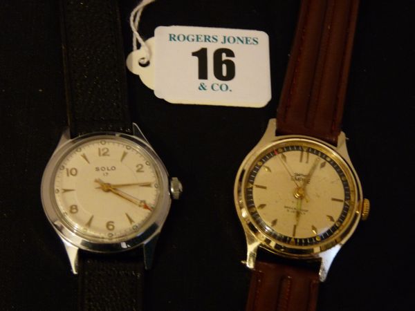 Watches.  Gent`s wristwatches. Stainless steel circular dial Solo with leather strap and a Smith`s