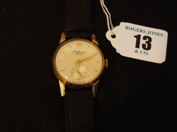 Watch. Gent`s 9 carat gold-encased circular dial wristwatch by J.W. Benson with Smith`s high grade