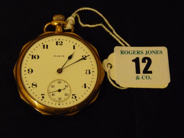 Watch.  A pocket watch. Rolled gold by Elgin with white enamel dial, sweep seconds dial, monogrammed