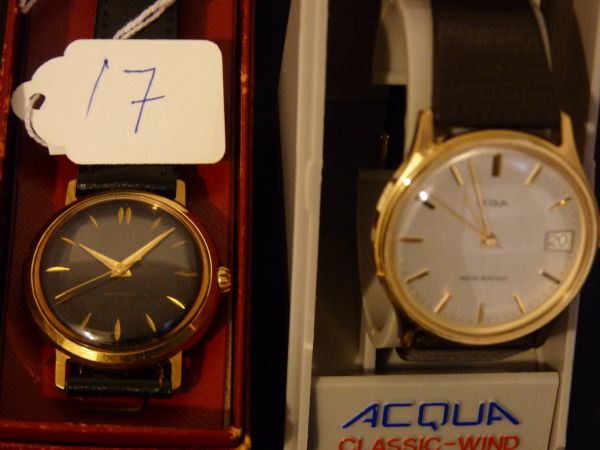 Watches.  Two wristwatches. A gent`s Timex rolled gold and stainless steel-encased circular dial