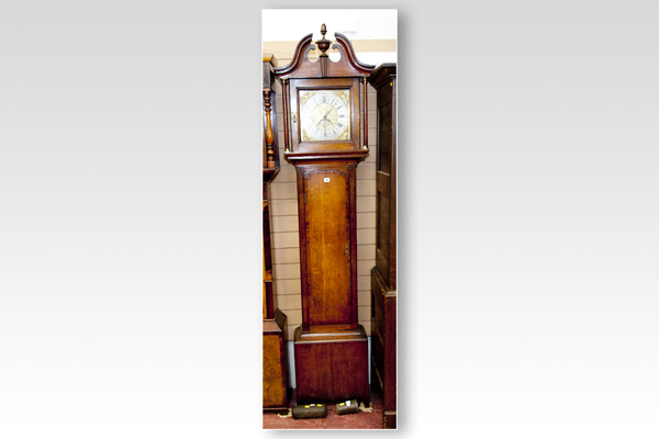A 19th Century oak crossbanded and mahogany partly re-furbished longcase clock having a square brass