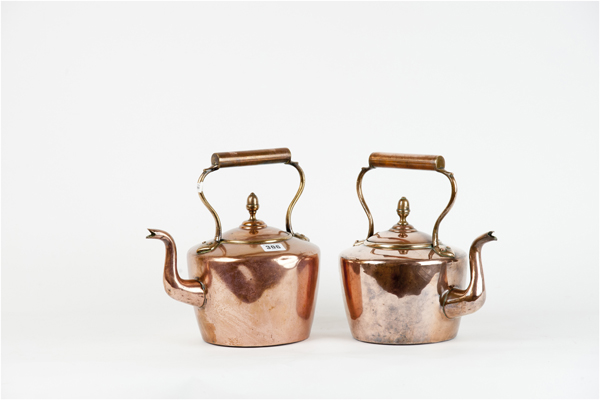 Two acorn knopped lidded copper kettles