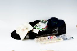 A large parcel of cricket programmes, miniature cricket bats and memorabilia; a Glamorgan hat; and a