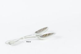 A pair of fiddle patterned silver serving spoons, 4.2 ozs, London 1824
