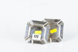 A pair of plain square silver ash trays, 4.2 ozs, London 1945