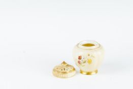 A Royal Worcester blush ground pot pourri vase with painted floral decoration and reticulated