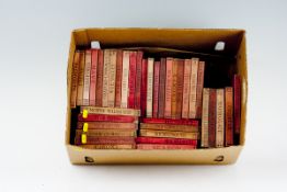 A large parcel of Ward Lock red covered English and Welsh maps and guides (approximately thirty-