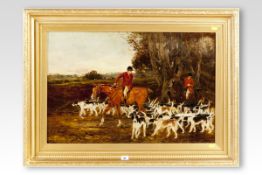 HARRY HIME oil on canvas; Two huntsmen with their pack, signed and dated 1890, 19.25 x 29.5 ins (