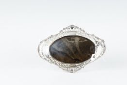 An oval pierced and scrolled silver fruit basket by Hamilton & Inches on four ball supports, 14 ozs,