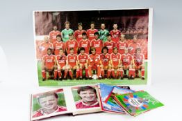 A parcel of FA Cup and other football programmes; an album of colour photographs of Liverpool