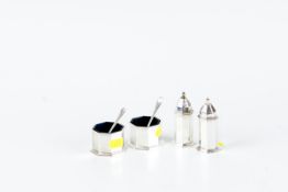 A four piece silver cruet set, each piece of octagonal form, 4 ozs, Birmingham 1947