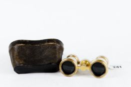 A cased pair of mother of pearl and brass opera glasses by Chadburns, Liverpool
