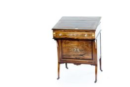 An Edwardian rosewood and inlaid small desk cabinet on square tapered supports