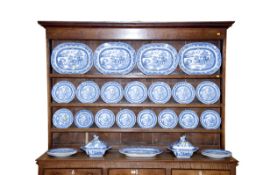 The Willow patterned platters, plates and tureens as displayed on Lot 24