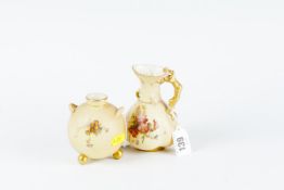 A Royal Worcester blush ground jug with dragon handle and painted floral decoration, 4.5 ins (11