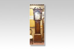 A mid 19th Century mahogany encased long case clock having an arched hood with painted dial having