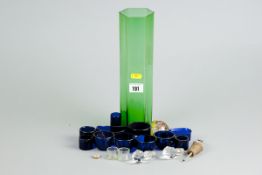 A parcel of Bristol blue condiment liners; and a green glass hexagonal chimney vase, 12 ins (30 cms)