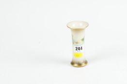 A Royal Worcester rose painted miniature trumpet vase, shape number G923 and dated for approximately