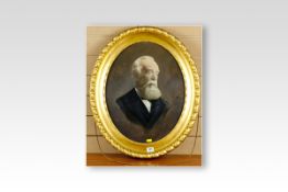 Coloured heightened photograph or print; an elegant bearded gentleman, oval format, 19.5 x 15.5
