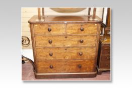 A Victorian mahogany chest of three long and two short drawers with turned wooden knobs, 48 ins (122