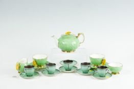 Six Royal Worcester cabinet coffee cups and saucers, green mottled band with Grecian key style black