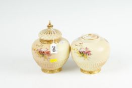 A Royal Worcester blush ground globular pot pourri vase and cover, shape number 1286 dated for
